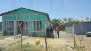 Church property. The plan is to build a 3-room school house where the gray building is located. 