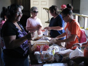 Making sandwiches to hand out 
